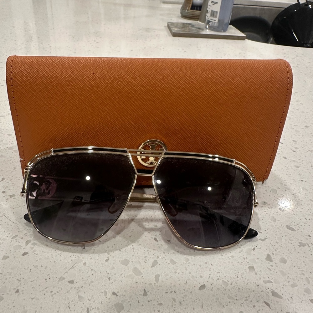 Michael Kors sunglasses.